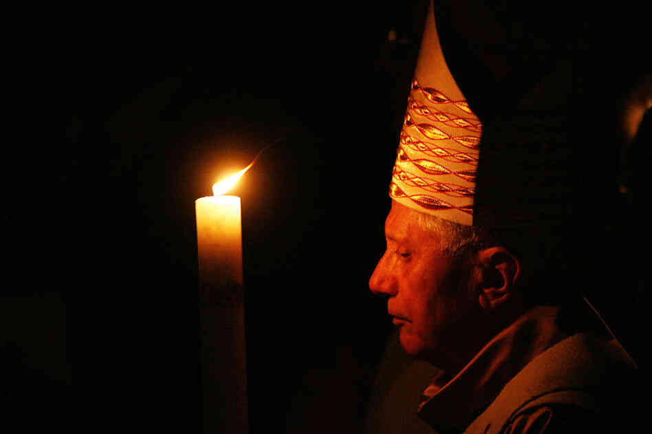 The pontiff attends the Easter Vigil in the Basilica of St. Peter in 2007, in Vatican City.