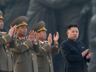 North Korean leader Kim Jong Un (right) claps during a ceremony unveiling statues honoring his grandfather and father, Kim Il Sung and Kim Jong Il, respectively, in Pyongyang last April. North Korean leader Kim Jong Un (right) claps during a ceremony unveiling statues honoring his grandfather and father, Kim Il Sung and Kim Jong Il, respectively, in Pyongyang last April.