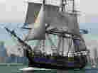 The HMS Bounty replica sails past the Chicago skyline in July 2003.