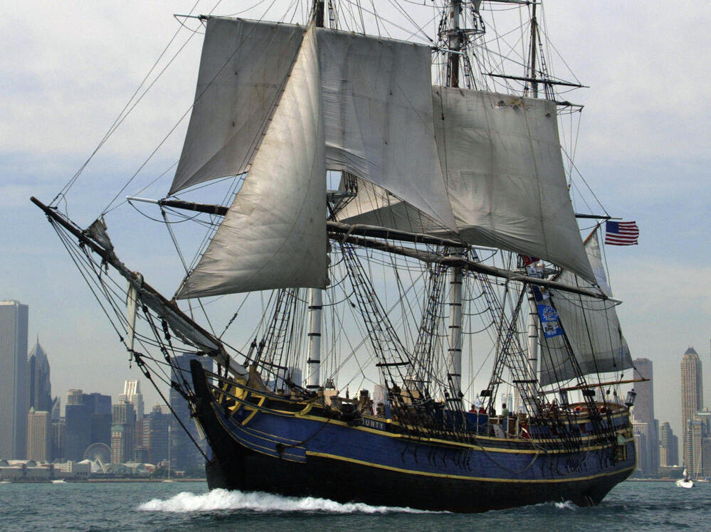 The HMS Bounty replica sails past the Chicago skyline in July 2003.