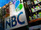 An NBC store is seen through a window reflecting Rockefeller Center in New York City. Comcast, the nation's largest cable company, has owned 51 percent of NBCUniversal since 2011. An NBC store is seen through a window reflecting Rockefeller Center in New York City. Comcast, the nation's largest cable company, has owned 51 percent of NBCUniversal since 2011.