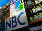 An NBC store is seen through a window reflecting Rockefeller Center in New York City. Comcast, the nation's largest cable company, has owned 51 percent of NBCUniversal since 2011. An NBC store is seen through a window reflecting Rockefeller Center in New York City. Comcast, the nation's largest cable company, has owned 51 percent of NBCUniversal since 2011.