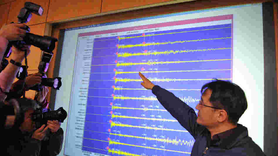 An official with the Korea Meteorological Administration shows a seismic image of a tremor caused by North Korea's nuclear test, in Seoul on Tuesday. An official with the Korea Meteorological Administration shows a seismic image of a tremor caused by North Korea's nuclear test, in Seoul on Tuesday.