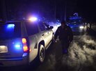 Police patrol a road block on Highway 38 into the Big Bear area where a shoot-out with suspected fugitive Christopher Dorner resulted in the death of one deputy in Angelus Oaks, Calif., on Tuesday. Police patrol a road block on Highway 38 into the Big Bear area where a shoot-out with suspected fugitive Christopher Dorner resulted in the death of one deputy in Angelus Oaks, Calif., on Tuesday.