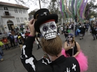 A reveler shows off his mask during the Krewe of Okeanos parade in New Orleans on Feb. 10, 2013. A reveler shows off his mask during the Krewe of Okeanos parade in New Orleans on Feb. 10, 2013.