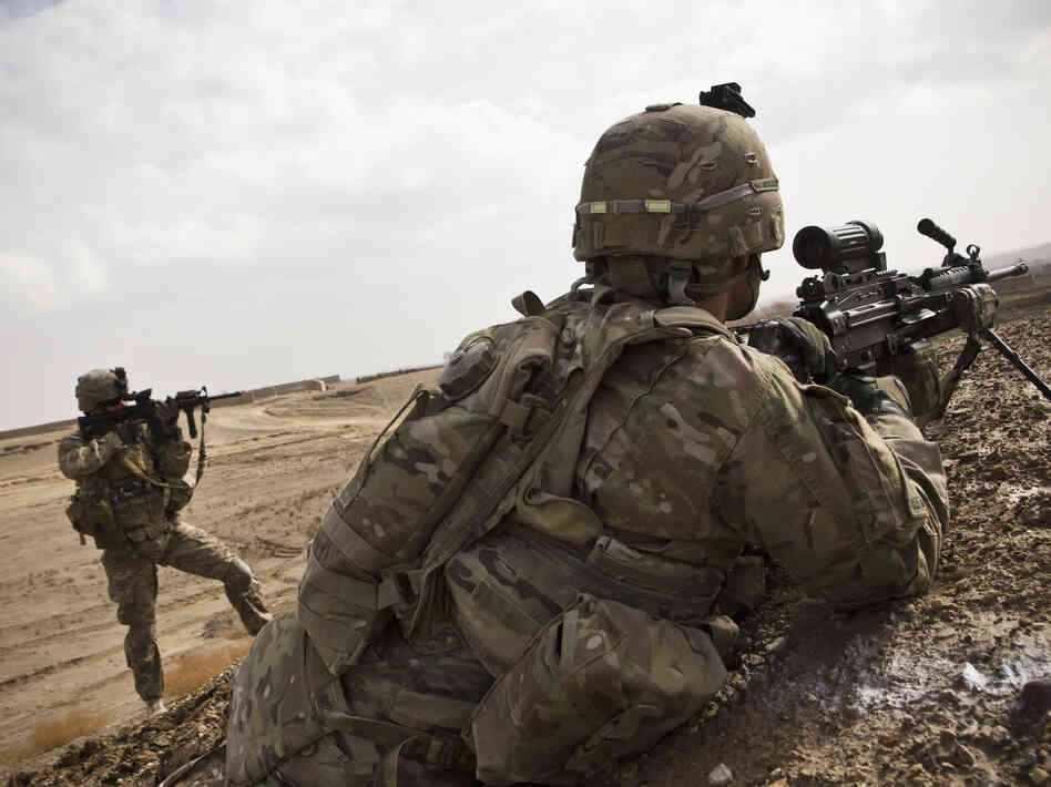 Soldiers with Charlie Company, 36th Infantry Regiment, 1st Armored Division, in Kandahar Province, Afghanistan, earlier in February. Soldiers with Charlie Company, 36th Infantry Regiment, 1st Armored Division, in Kandahar Province, Afghanistan, earlier in February.