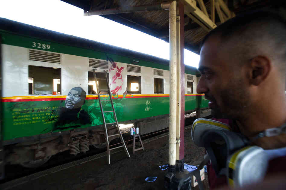 WiseTwo, 26, steps back to look before adding finishing touches. "Where this train is going," he says, "a lot of people won't know who Martin Luther King is."