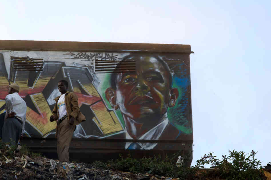 U.S. President Barack Obama as rendered by the artist Bankslave, who was born and still lives in the Kibera slum. During the previous election violence, looters spared his house when they recognized him as "the guy who paints murals" around Kibera.