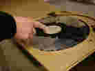 A 16-inch lacquer disc, a format used in the 1930s, from the collection of the Library of Congress. Most of the lacquer, the part of the disc where the sound was etched, has been lost to decay.