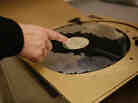 A 16-inch lacquer disc, a format used in the 1930s, from the collection of the Library of Congress. Most of the lacquer, the part of the disc where the sound was etched, has been lost to decay.