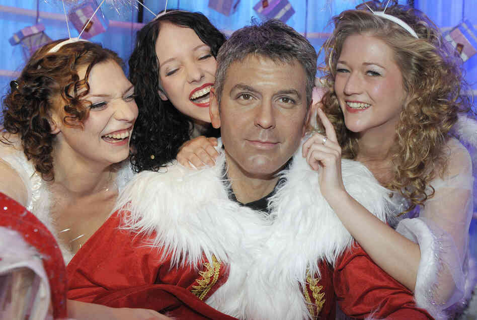 Models pose with Wax George Clooney in Berlin in 2008. Models pose with Wax George Clooney in Berlin in 2008.