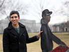 Los Angeles-based artist Ramiro Gomez Jr. displays his immigrant worker art on the Capitol's East Lawn in Washington, D.C. Los Angeles-based artist Ramiro Gomez Jr. displays his immigrant worker art on the Capitol's East Lawn in Washington, D.C.