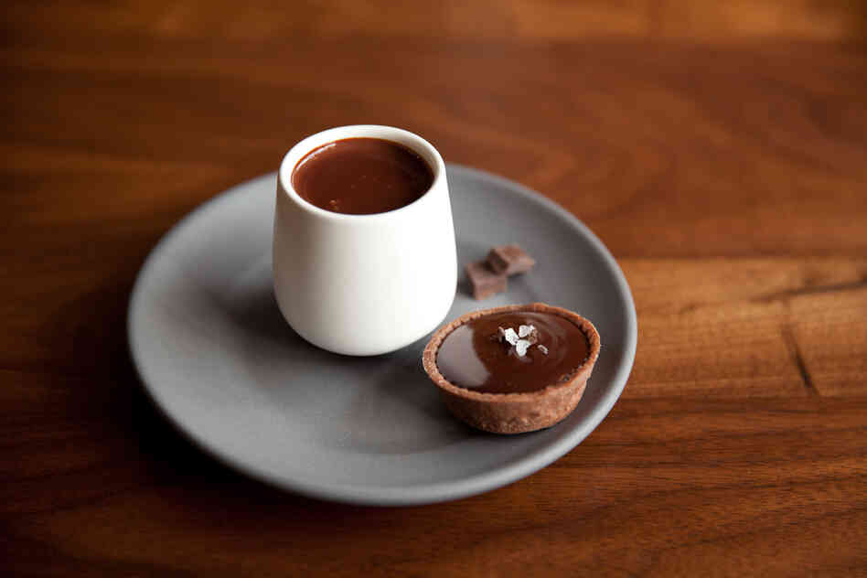Is it chocolate yet? Customers can test the finished product on the spot at Dandelion Chocolate's storefront cafe. 