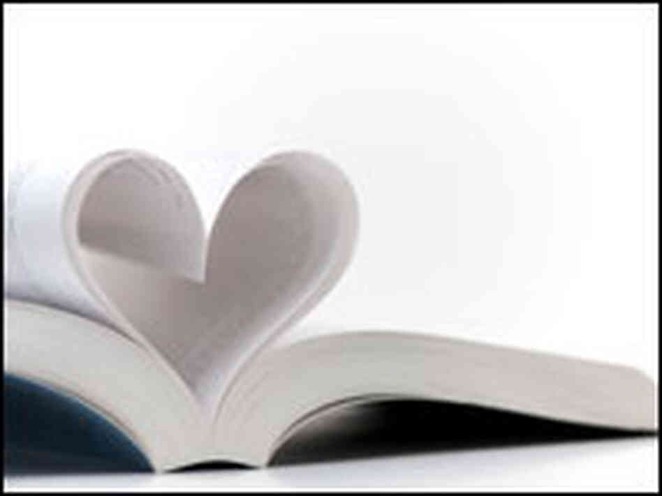 Book with pages making the shape of a heart. Book with pages making the shape of a heart.