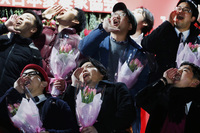 Men shout messages of love during the annual event. One Japanese writer says the country has