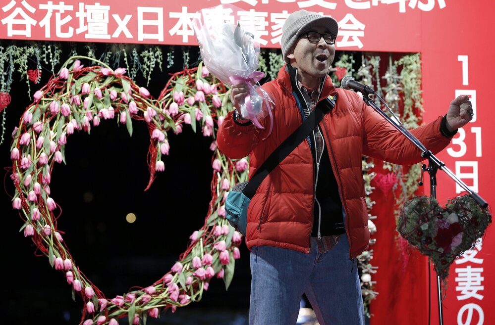 A man shouts his love at an event in Tokyo on Jan. 29. The event comes two days ahead of Beloved Wives Day, a day on which husbands publicly scream their love for their wives before a crowd of onlookers. Husbands are also urged to head home early to express gratitude to their wives.