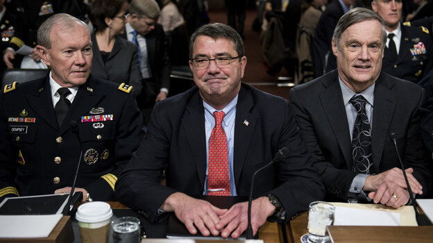Joint Chiefs of Staff Chairman Martin Dempsey (from left), Deputy Secretary of Defense Ashton Carter and Undersecretary of Defense and Comptroller Robert Hale wait for a hearing of the Senate Armed Services Committee on Tuesday. Military leaders are warning Congress about the effects of the sequester.