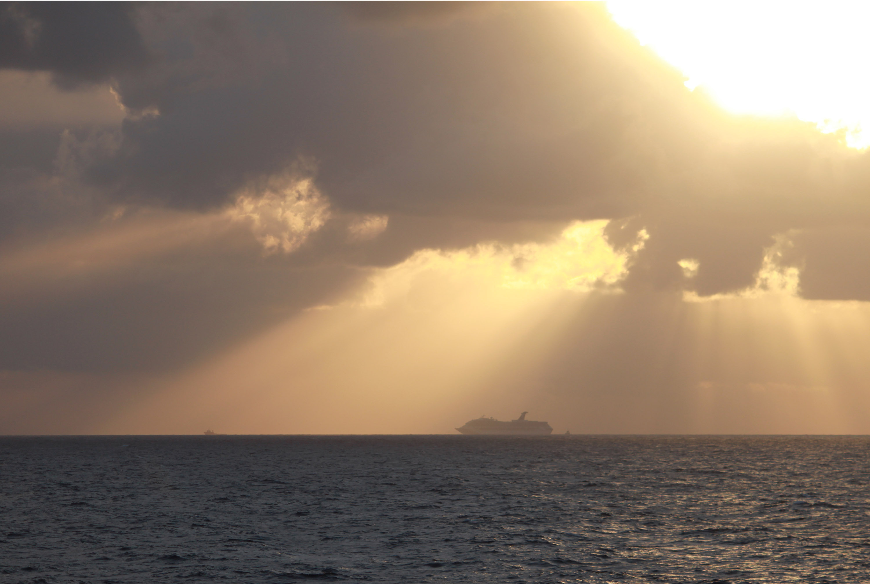 In this handout from the U.S. Coast Guard the tugs Resolve Pioneer and Dabhol tow and steer the disabled 893-foot Carnival Triumph cruise ship on Tuesday in the Gulf of Mexico.
