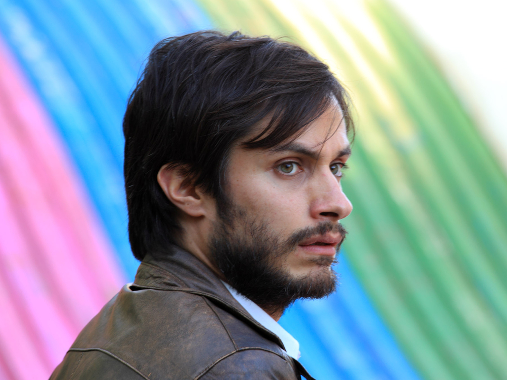 The bright colors and throwback feel of the Chilean drama No mask the very real political consequences of the 1988 plebiscite it depicts. (Pictured: Gael Garcia Bernal as Rene Saavedra)