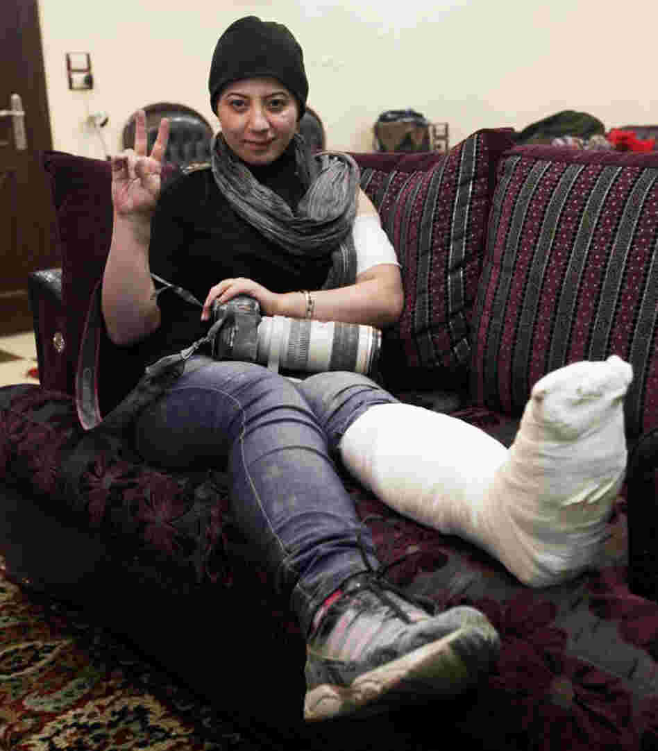 Kelze recently suffered a broken ankle when a wall collapsed on her during a firefight. She is recovering in Turkey, but plans to return to the front lines after she heals.