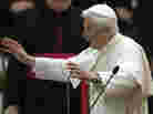 Pope Benedict XVI delivers his blessing after an audience with the Roman clergy in the Paul VI Hall at the Vatican on Thursday.