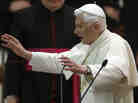 Pope Benedict XVI delivers his blessing after an audience with the Roman clergy in the Paul VI Hall at the Vatican on Thursday.