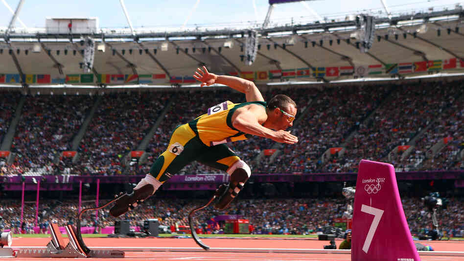 Oscar Pistorius of South Africa leaves the starting blocks of the men's 400-meter race at the 2012 London Olympics.