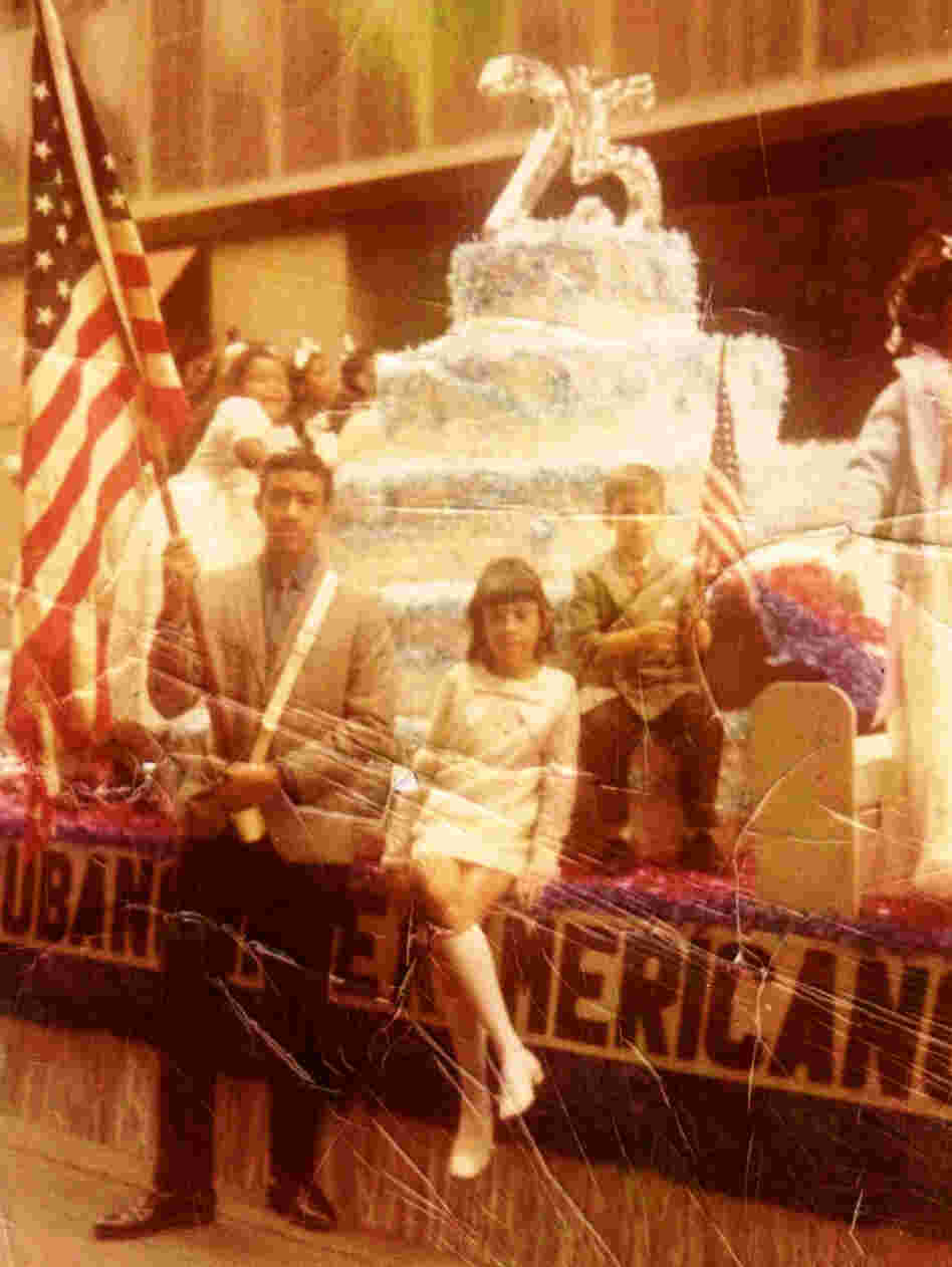 George Prendes (left), with siblings Mercedes and Roberto at a Cuban-American parade in New York in the early 1970s. The family spent their savings trying to assist George after his arrest.