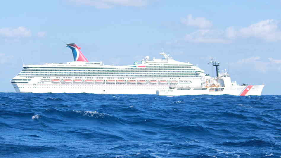 The Carnival cruise ship Triumph drifts in the Gulf of Mexico Monday, before the arrival of tugs that are now towing it to Mobile. The ship is expected to arrive Thursday night. The Carnival cruise ship Triumph drifts in the Gulf of Mexico Monday, before the arrival of tugs that are now towing it to Mobile. The ship is expected to arrive Thursday night.