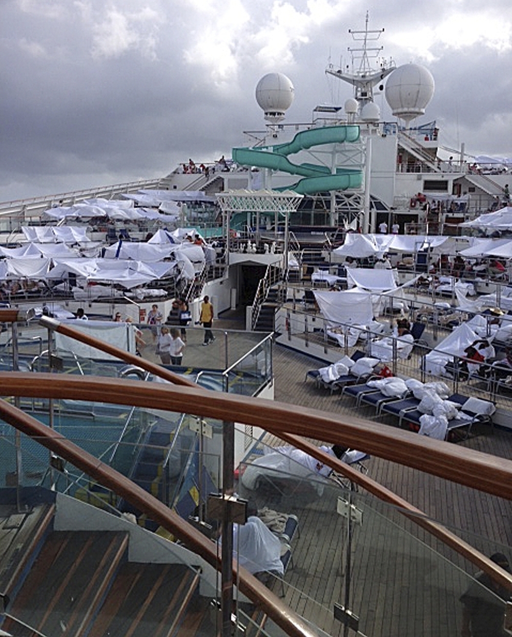 Makeshift tents are seen on the deck of the Carnival cruise ship Triumph, in a photo taken Sunday, the first day it spent without engine power. The image was provided by Kalin Hill of Houston.