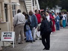 Lines of voters wait to cast their ballots as the polls open in St. Petersburg, Fla., on Nov. 6. Lines of voters wait to cast their ballots as the polls open in St. Petersburg, Fla., on Nov. 6.