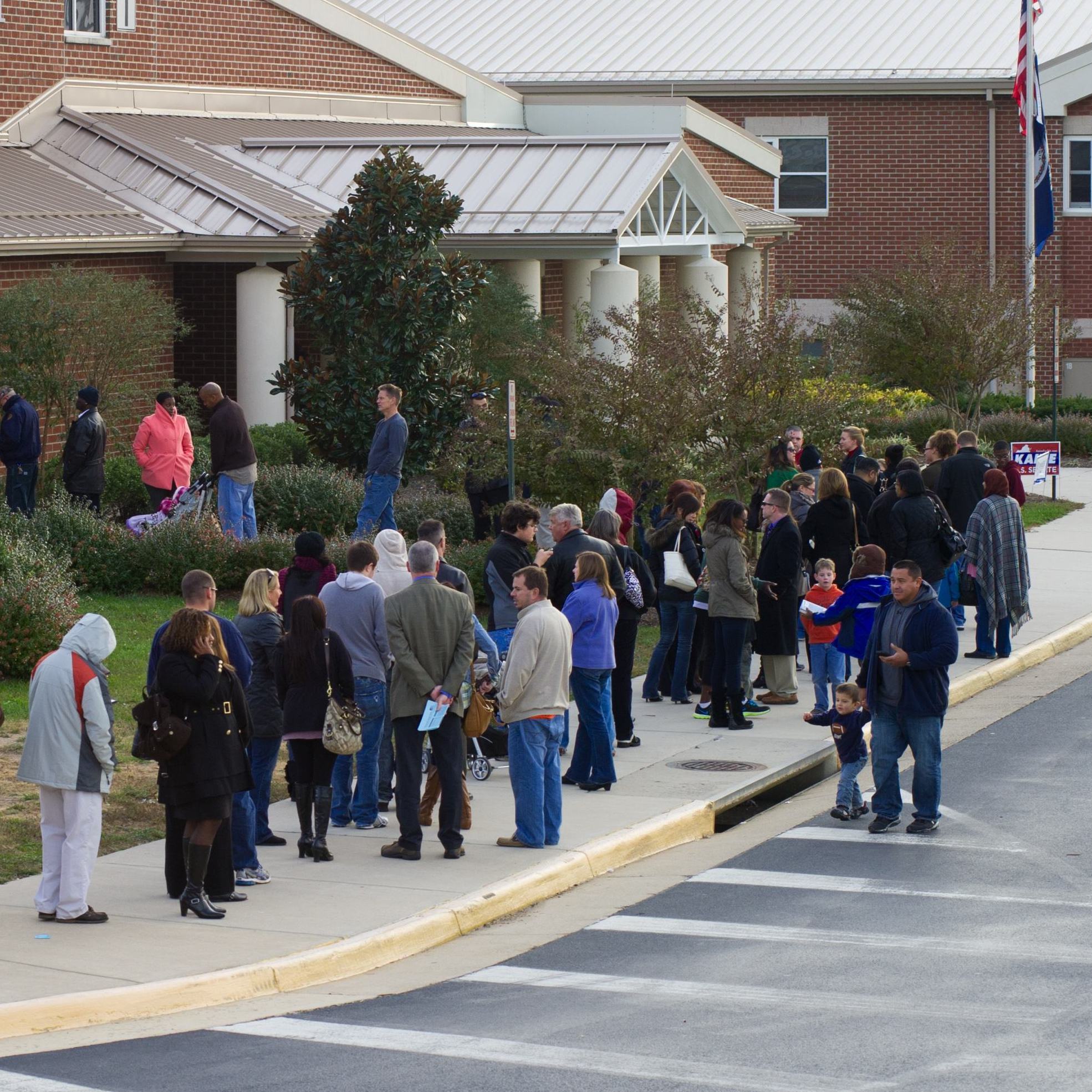 Voters wait in long lines to cast their ballots on Nov. 6 at Victory Elementary School in Bristow, Va.