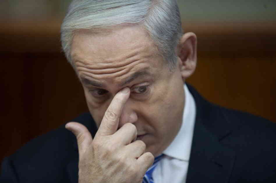 Israeli Prime Minister Benjamin Netanyahu heads the weekly cabinet meeting in his office on February 10 in Jerusalem, Israel.