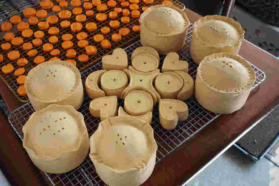 Faux carrots and mince pies await their finishing touches.