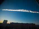 In this photo provided by Chelyabinsk.ru a meteorite contrail is seen over Chelyabinsk on Friday. In this photo provided by Chelyabinsk.ru a meteorite contrail is seen over Chelyabinsk on Friday.
