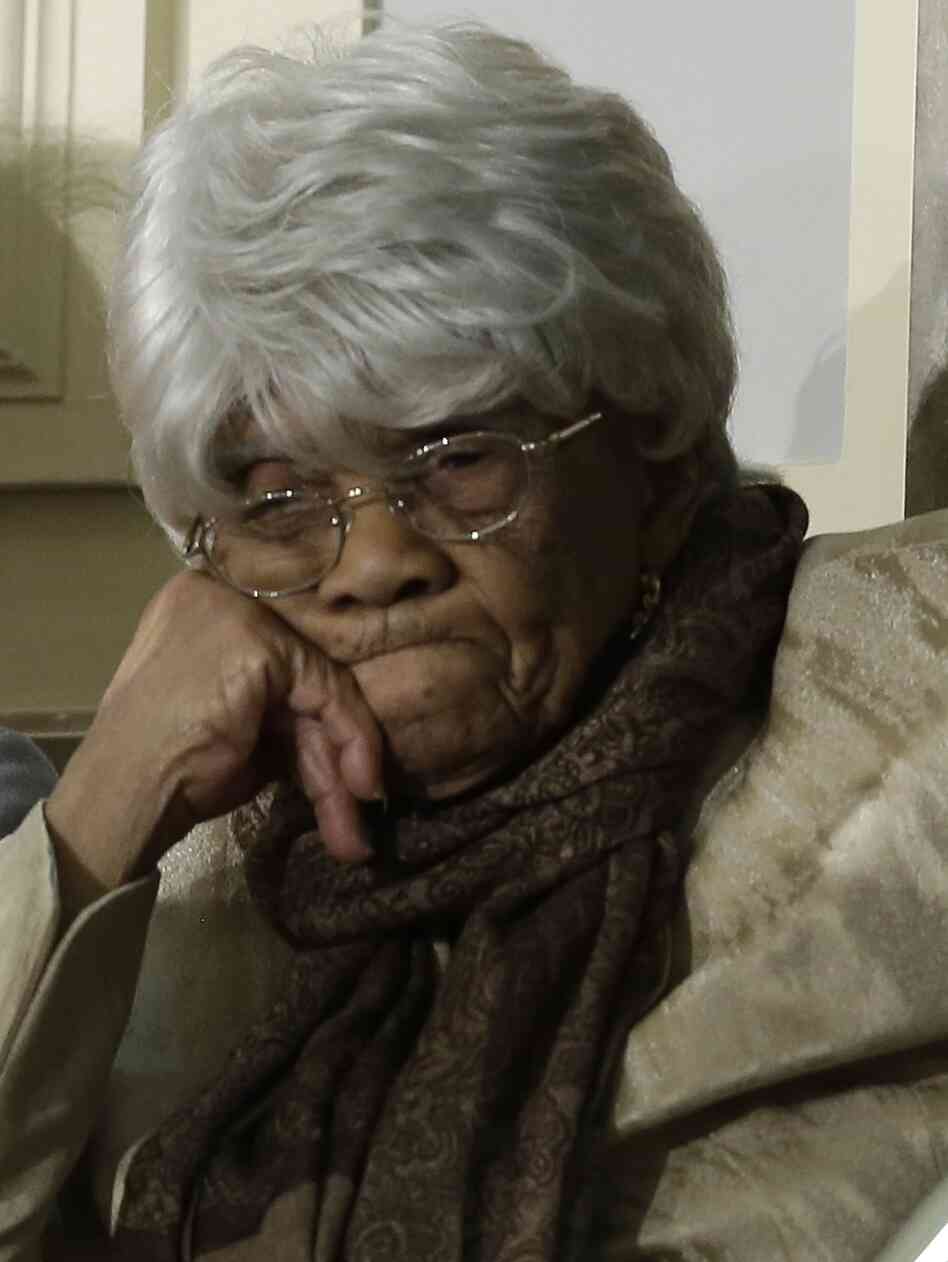 Desiline Victor, 102, of North Miami, awaits the start of President Obama's State of the Union address, which she attended Tuesday in the U.S. Capitol. The president spoke about Victor's long wait to vote last year.