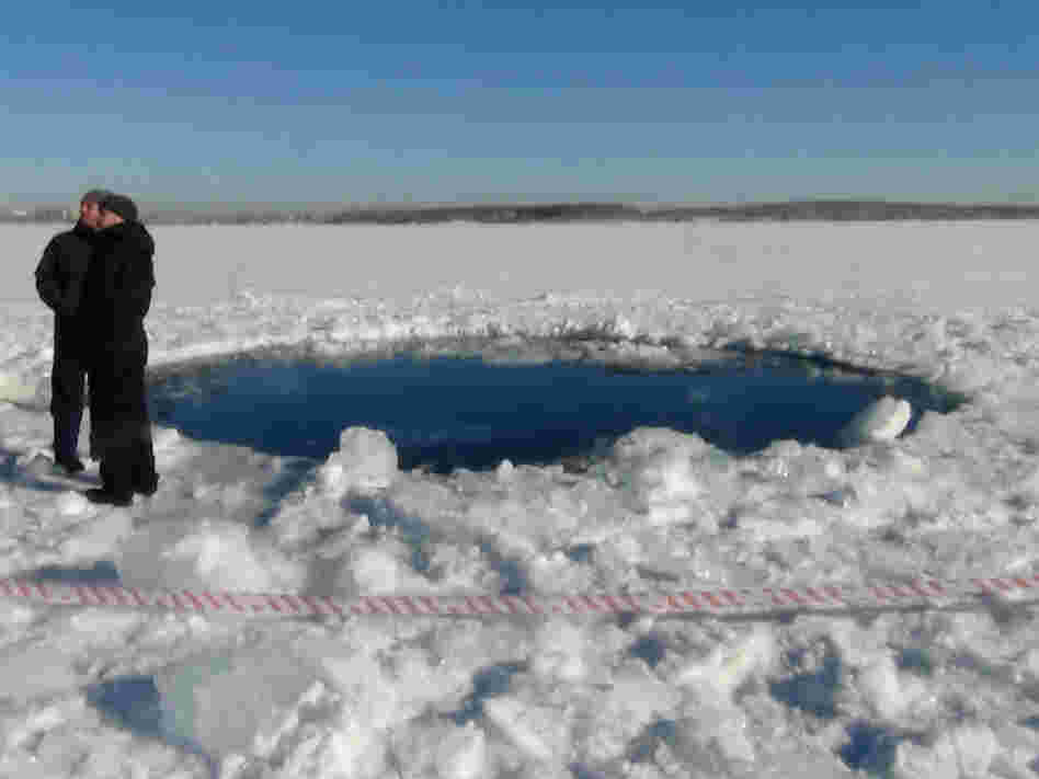 A hole in the ice of Chebarkul Lake where a meteor reportedly struck the lake near Chelyabinsk, about 930 miles east of Moscow