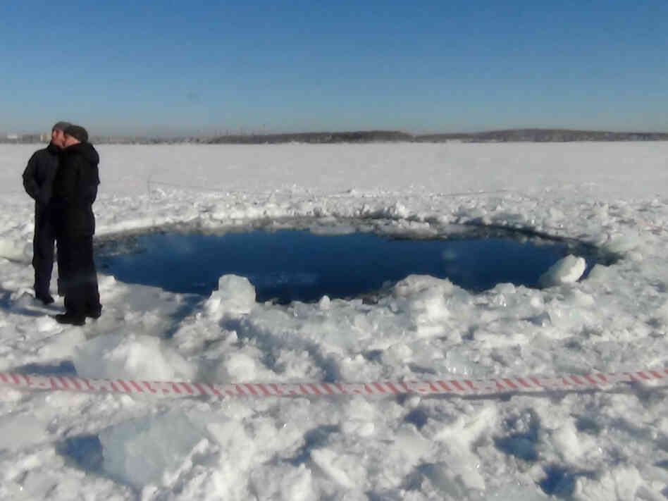 A hole in the ice of Chebarkul Lake where a meteor reportedly struck the lake near Chelyabinsk, about 930 miles east of Moscow