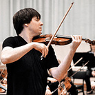 Violinist Joshua Bell conducts the Academy of St. Martin in the Fields by doing what comes naturally to him. The celebrated soloist is also the London orchestra's music director.