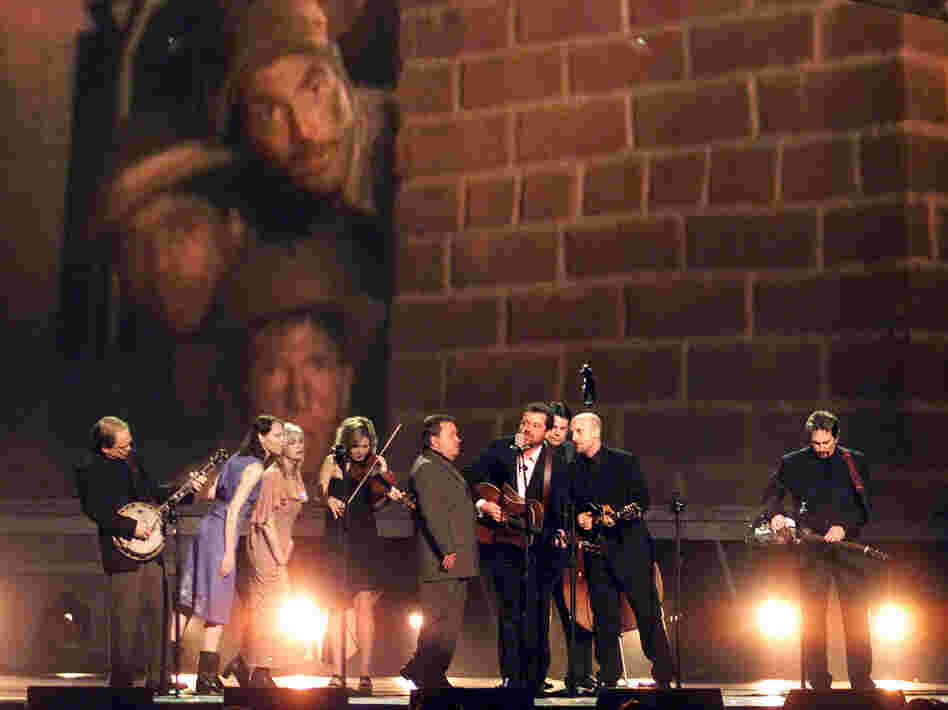 Gillan Welch (left), Emmylou Harris (center), and Alison Krauss with The Soggy Bottom Boys perform songs from the O Brother Where Art Thou? soundtrack at the 44th Annual Grammy Awards.