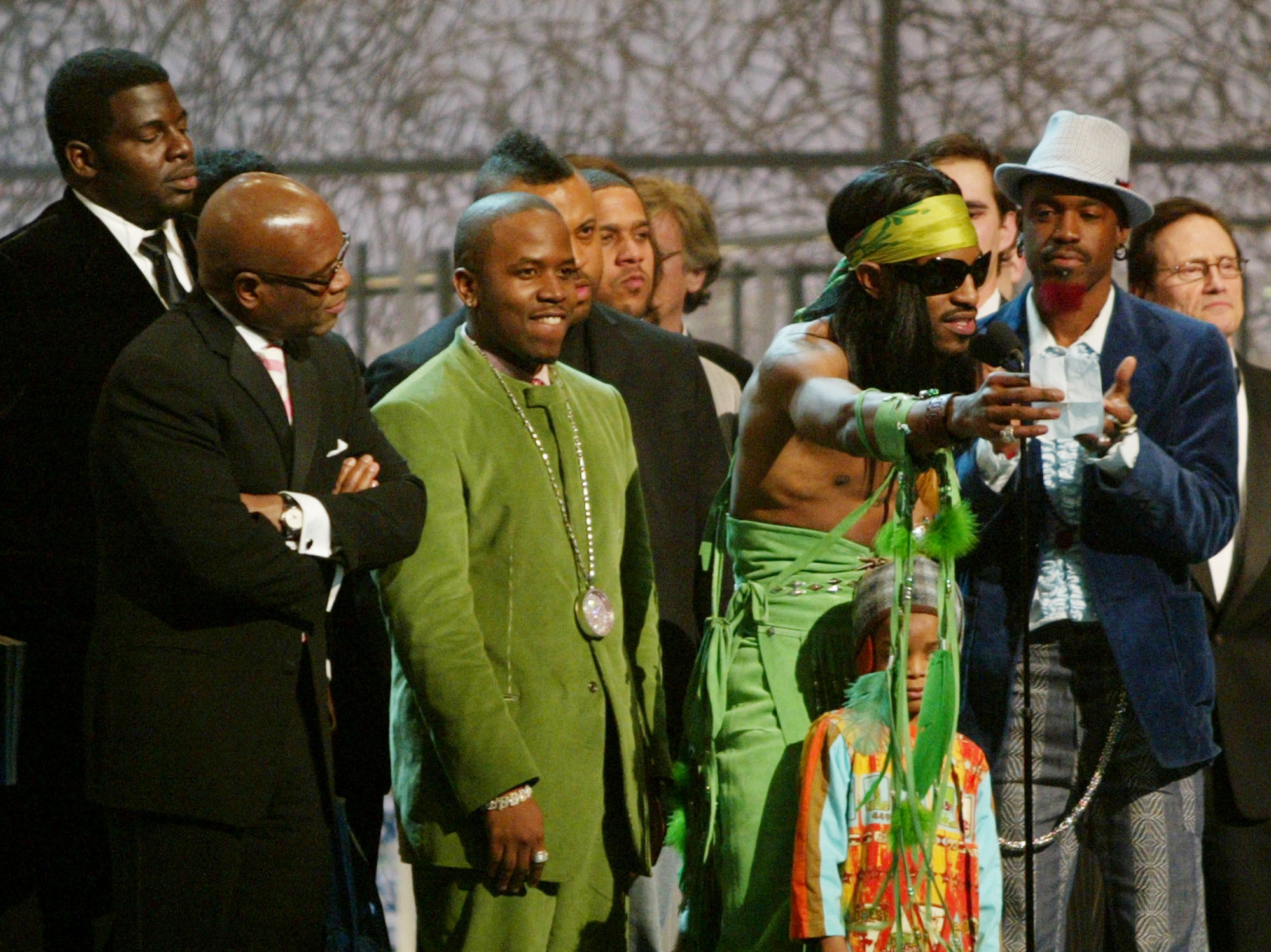 Andre 3000 (at microphone) and Big Boi of OutKast accept the Grammy for Album of the Year at the 46th Annual Grammy Awards.
