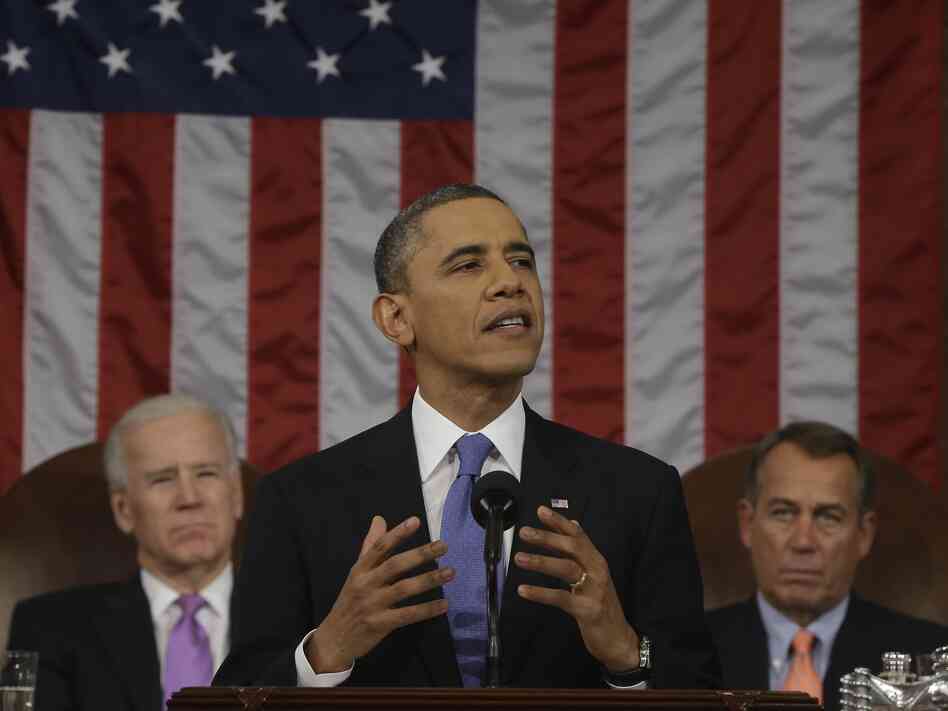 President Barack Obama, flanked by Vice President Joe Biden, left, and Speaker of the House Representatives John Boehner during the State of the Union address on Tuesday.