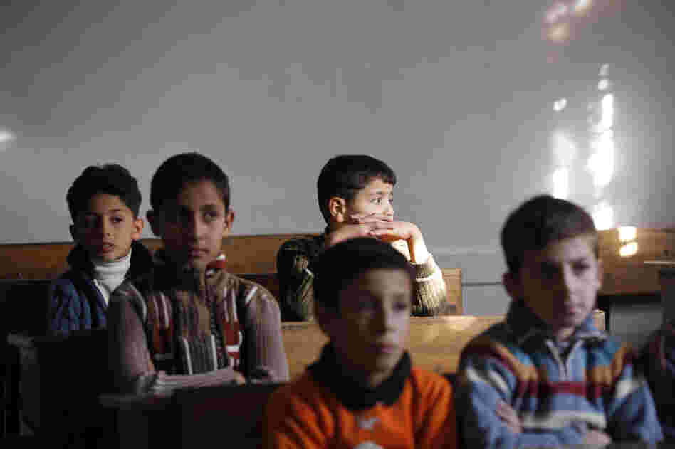 Children attend school in Aleppo in November.