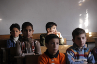 Children attend school in Aleppo in November.