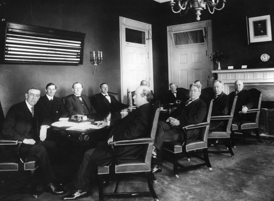 President Woodrow Wilson meets with his first Cabinet, circa 1912. Should Cabinets have a more central role in a president's decision making?
