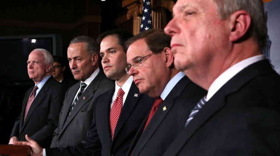 Sen. Charles Schumer, D-N.Y. and Sen. Marco Rubio, R-Fla., (second and third from left) announced plans to work on a bipartisan immigration proposal with their colleagues on Jan. 28 on Capitol Hill. They were also some of the first to respond to a leaked White House proposal.