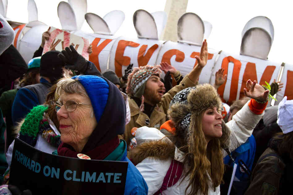 Protestors chant "Shift the Power" during the Forward on Climate Rally