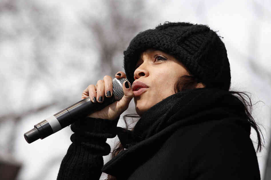 Actress Rosario Dawson addresses the crowd at the Forward on Climate Rally, before marching in solidarity with activists from the Indigenous Environmental Network