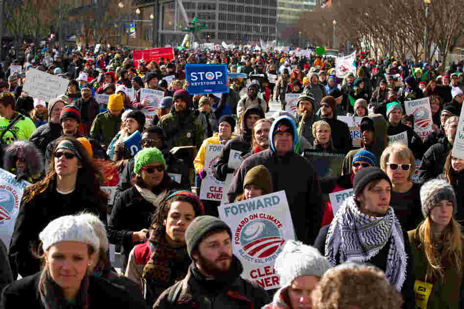 Marchers filled Pennsylvania Avenue directly in front of the White House, with many participants stopping to chant slogans and take pictures beside the fence.