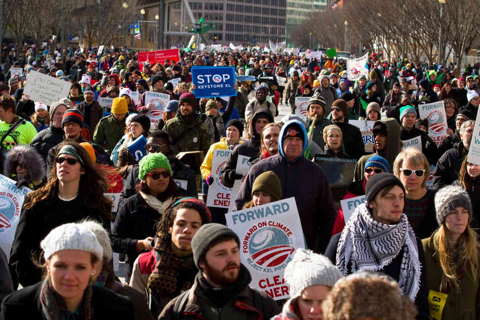 Marchers filled Pennsylvania Avenue directly in front of the White House, with many participants stopping to chant slogans and take pictures beside the fence.